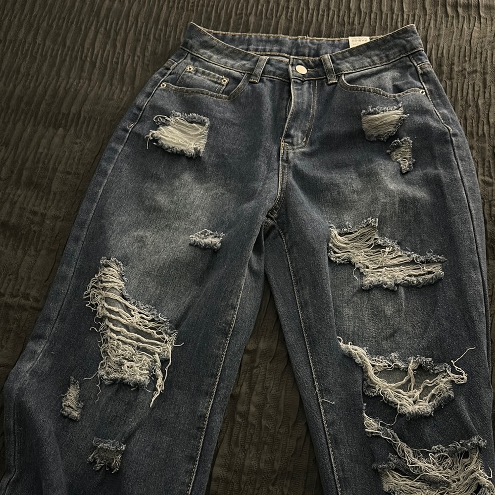 Distressed Blue Jeans